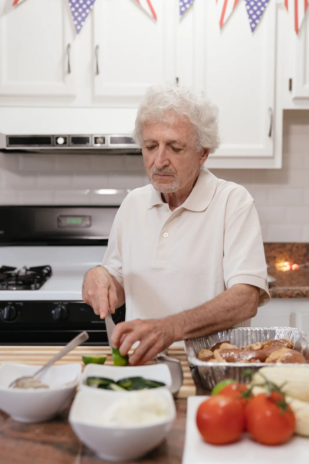 Older man preparing an everyday meal with fresh ingredients